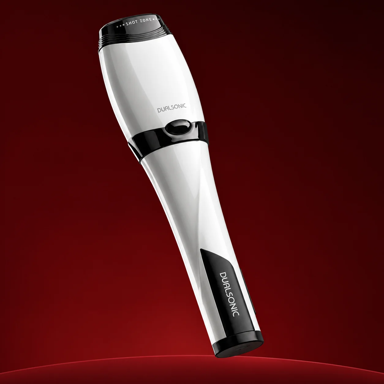 Dualsonic Optimum édition Ash posé en diagonale sur fond rouge